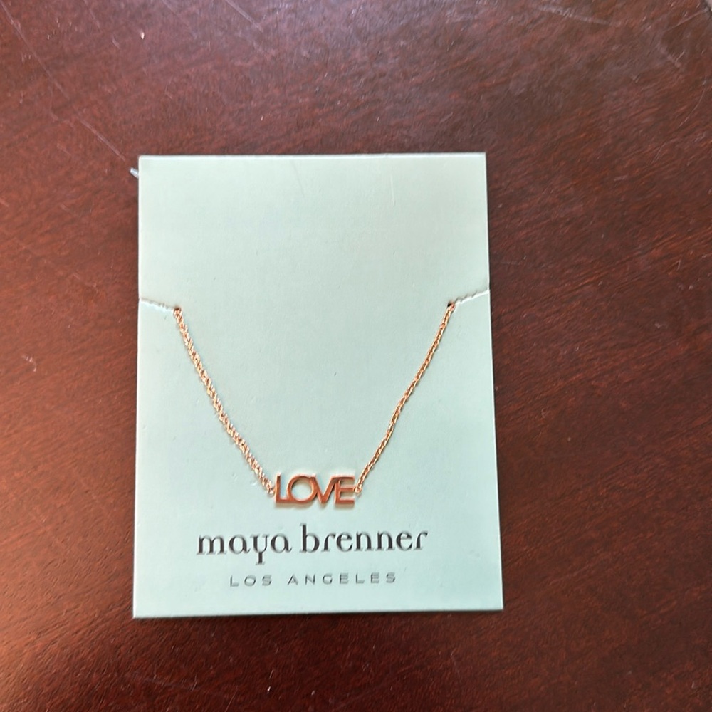 NWT LOVE wrist bracelet or ankle bracelet in gold.